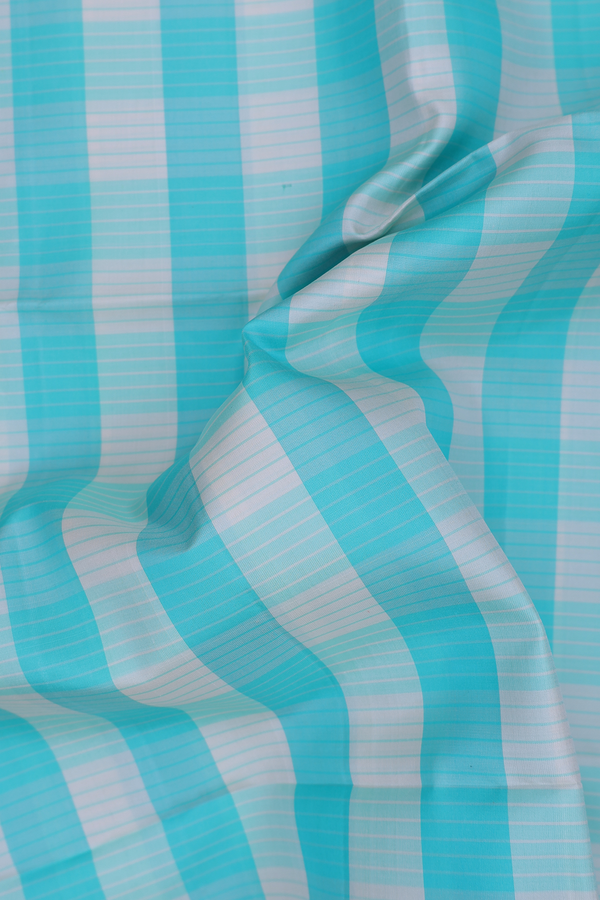 Soft Silk Saree In Blue And Cream With Checks Design