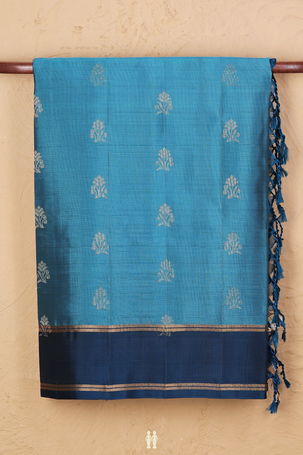 Soft Silk Saree In Blue With Floral Buttas