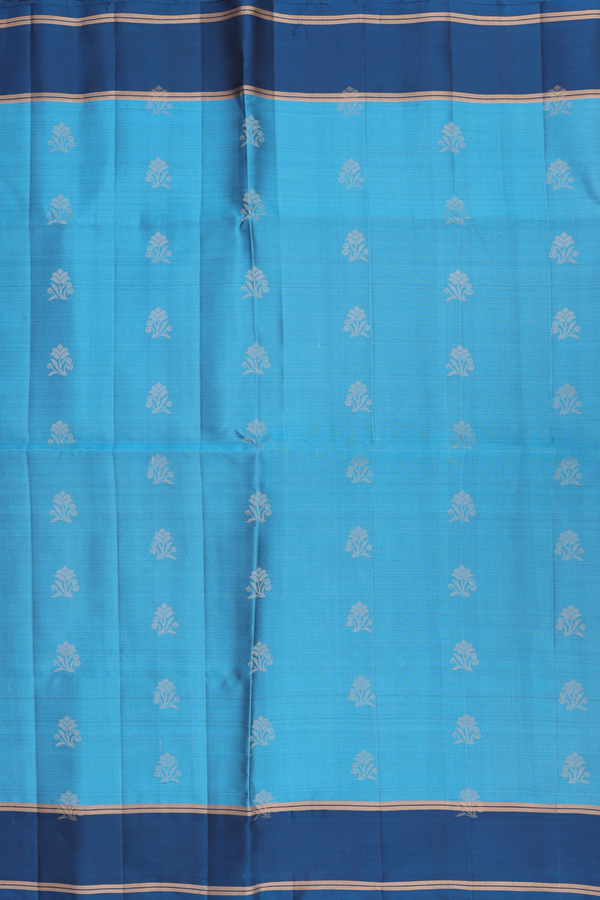 Soft Silk Saree In Blue With Floral Buttas