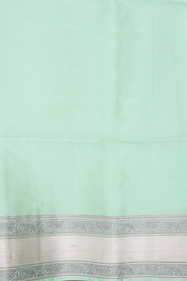 Soft Silk Saree In Mint Green With Peacock Buttas