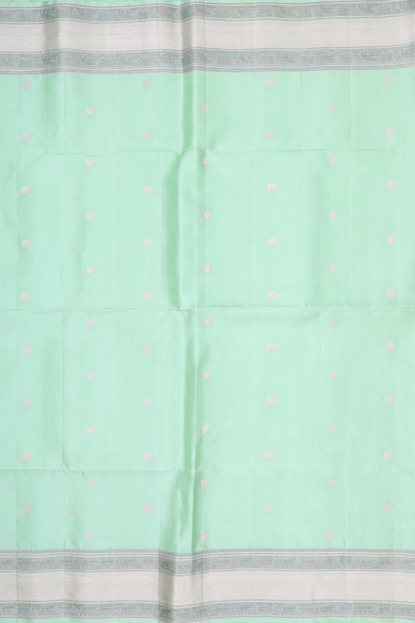 Soft Silk Saree In Mint Green With Peacock Buttas