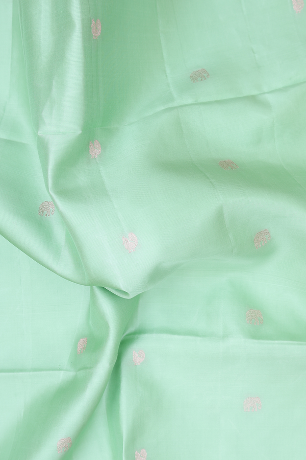 Soft Silk Saree In Mint Green With Peacock Buttas