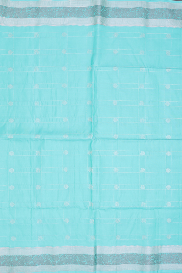 Soft Silk Saree In Tiffany Blue Along Checks With Buttas