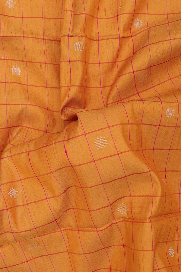 Soft Silk Saree In Yellow Along Checks With Buttas