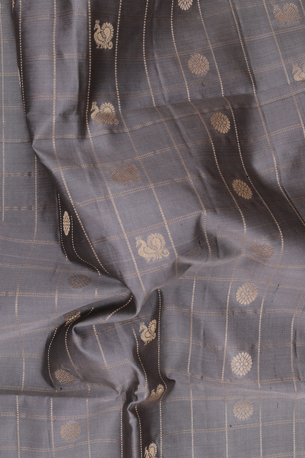 Soft Silk Saree In Grey Along Checks With Buttas