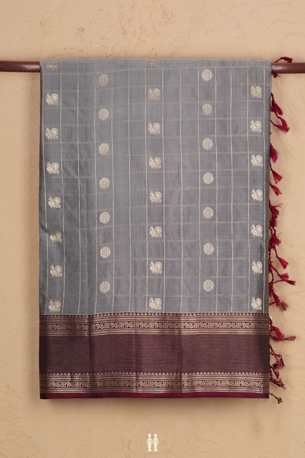 Soft Silk Saree In Grey Along Checks With Buttas