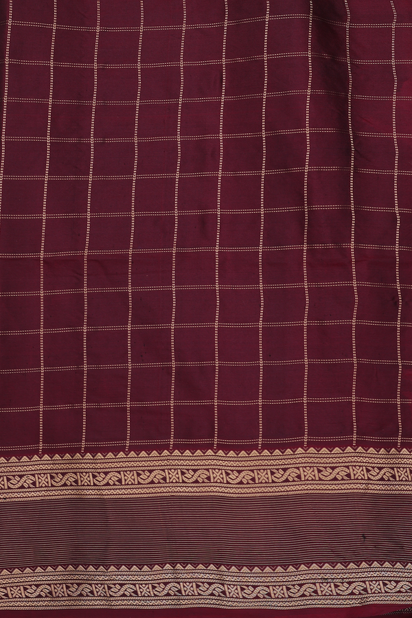 Soft Silk Saree In Grey Along Checks With Buttas