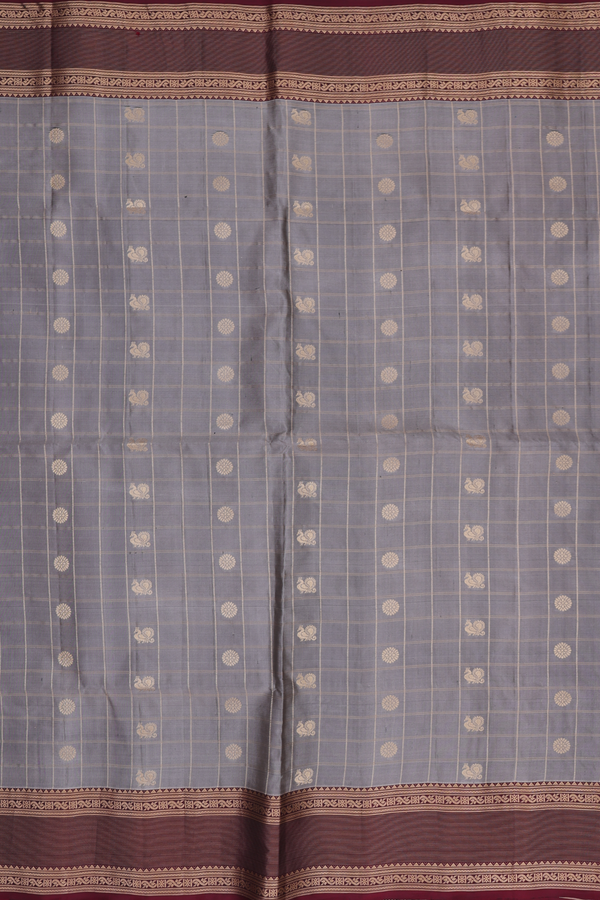 Soft Silk Saree In Grey Along Checks With Buttas