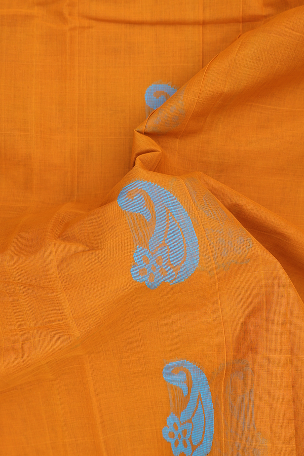 Kanchi Cotton Saree In Ochre Orange With Paisley Buttas