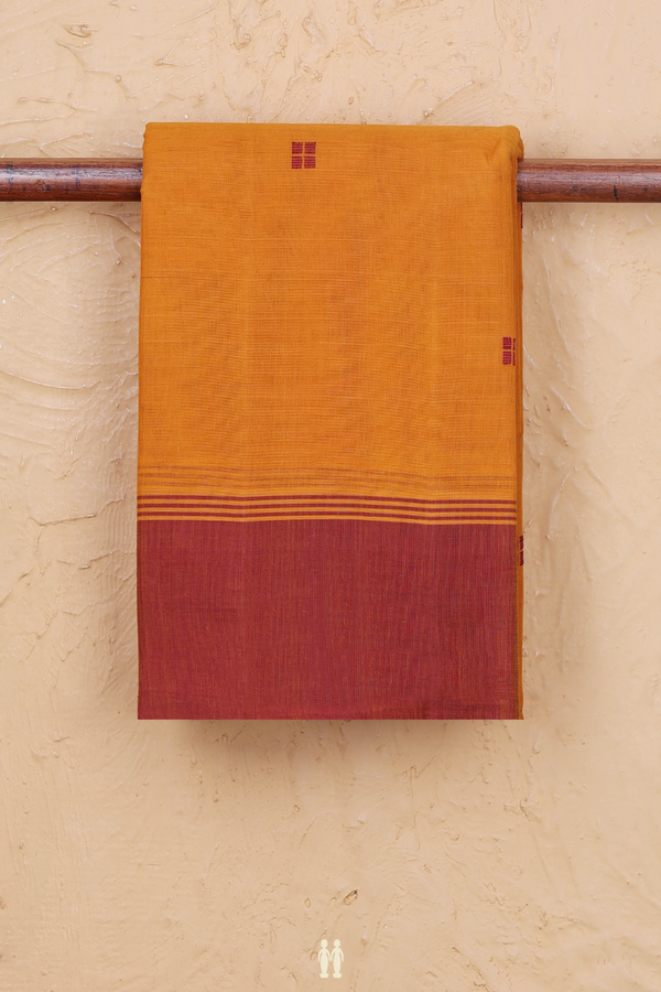 Kanchi Cotton Saree In Ochre Orange With Threadwork Buttas