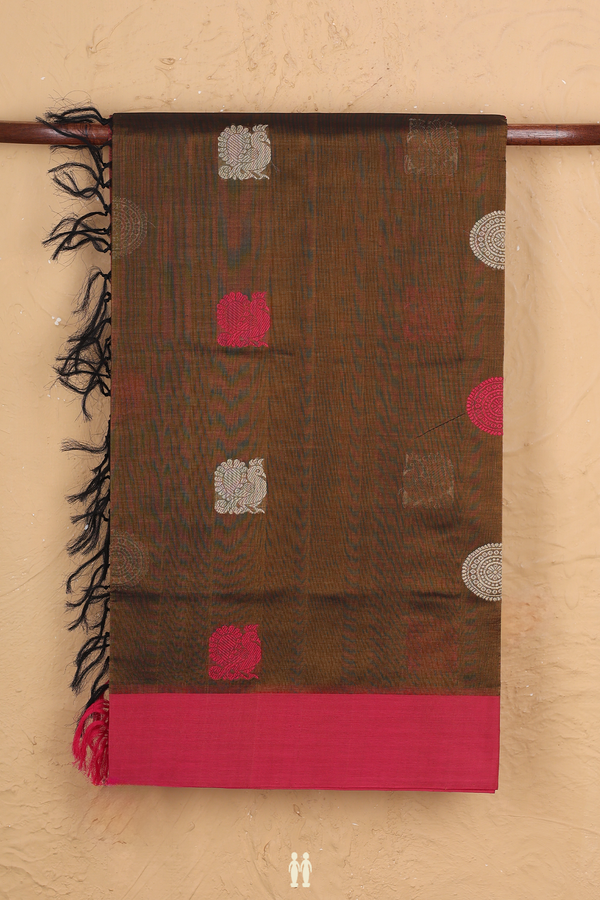 Silk Cotton Saree In Greenish Brown With Peacock Buttas