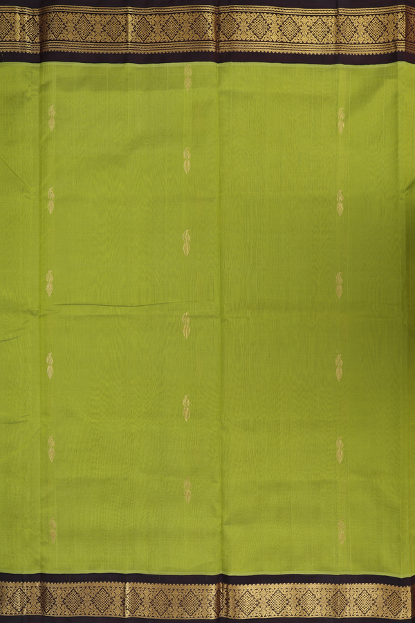 Traditional Silk Cotton Saree In Green With Zari Buttas