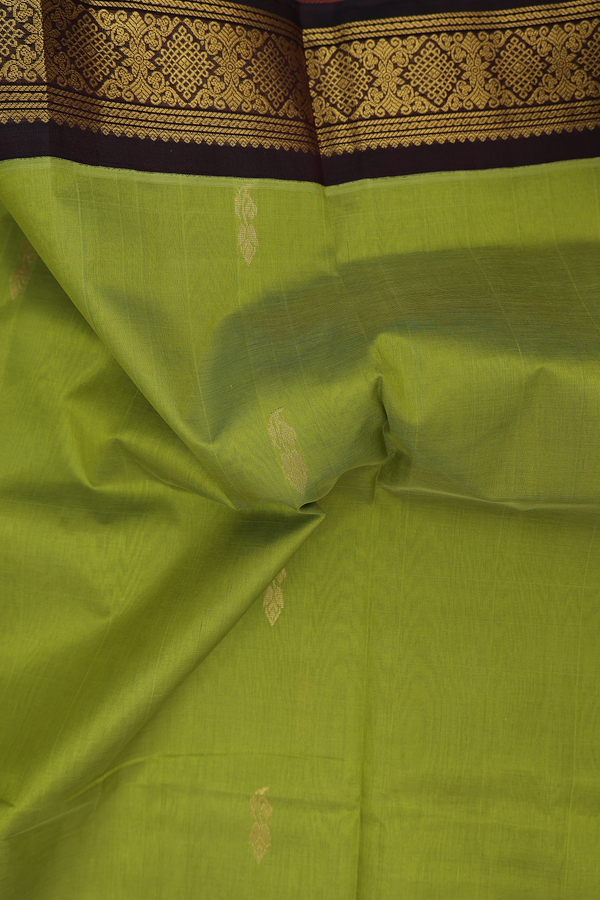 Traditional Silk Cotton Saree In Green With Zari Buttas