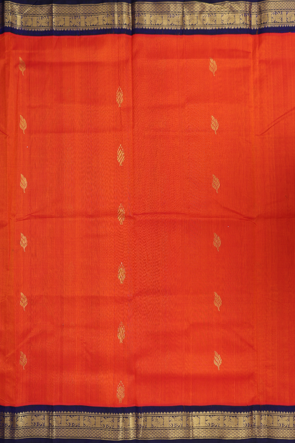 Silk Cotton Saree In Reddish Orange With Leaf Buttas