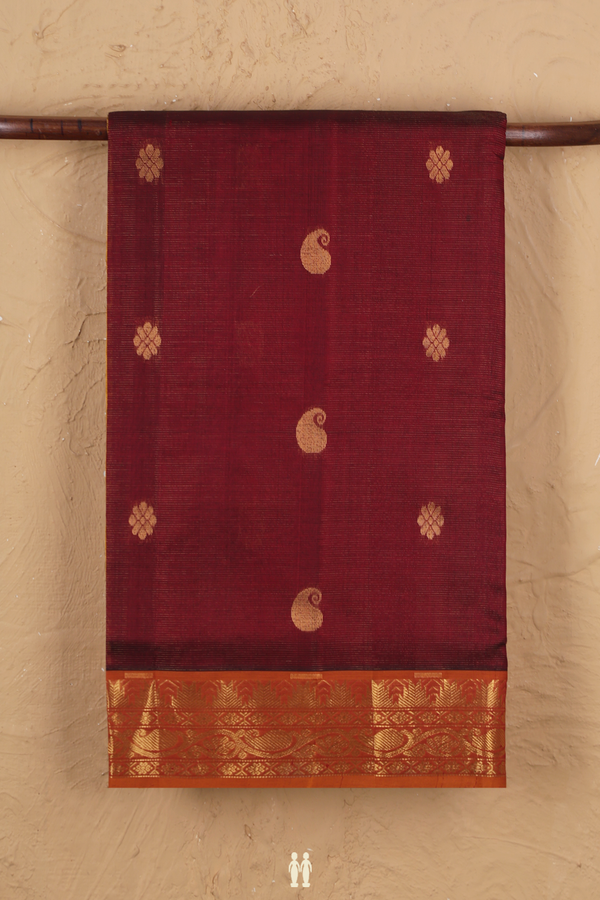 Traditional Silk Cotton Saree In Maroon With Paisley Buttas