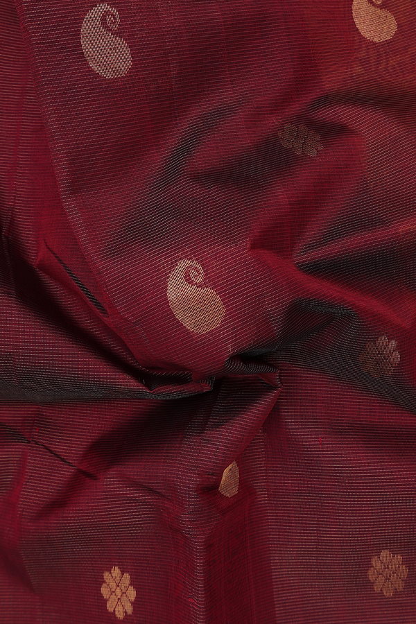 Traditional Silk Cotton Saree In Maroon With Paisley Buttas
