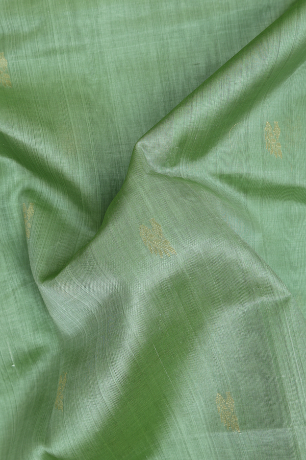 Traditional Silk Cotton Saree In Green With Zari Buttas