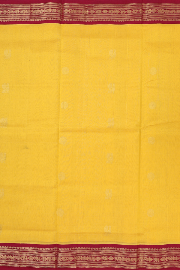 Silk Cotton Saree In Yellow With Peacock Buttas