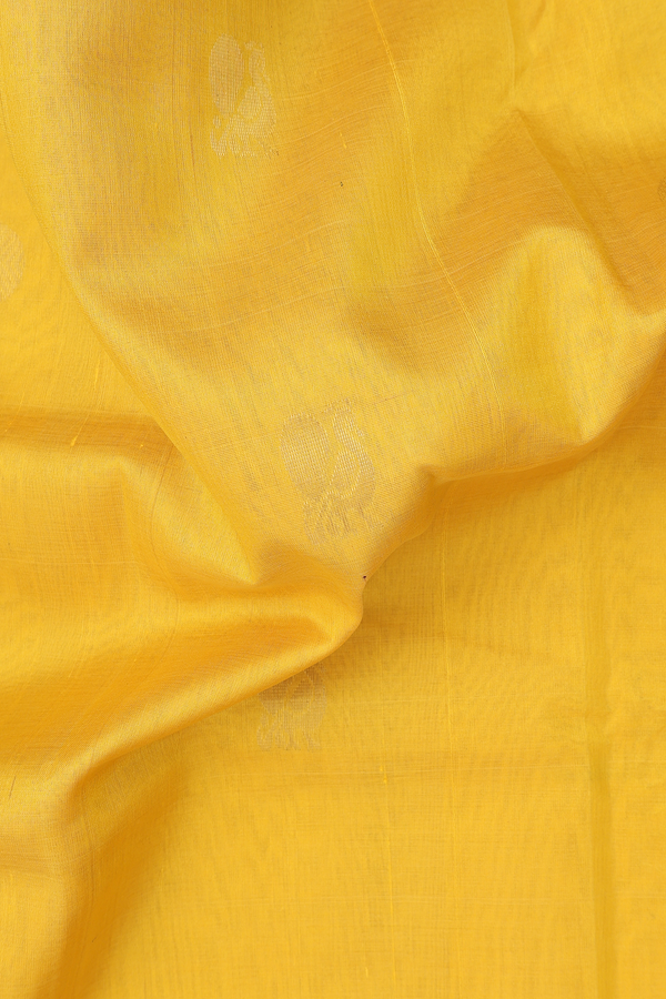 Silk Cotton Saree In Yellow With Peacock Buttas