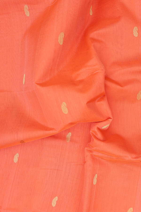Silk Cotton Saree In Bright Orange With Paisley Buttas