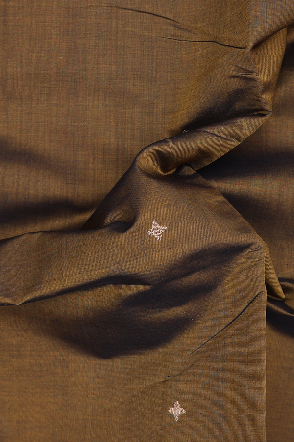 Silk Cotton Saree In Browish Green With Zari Buttis