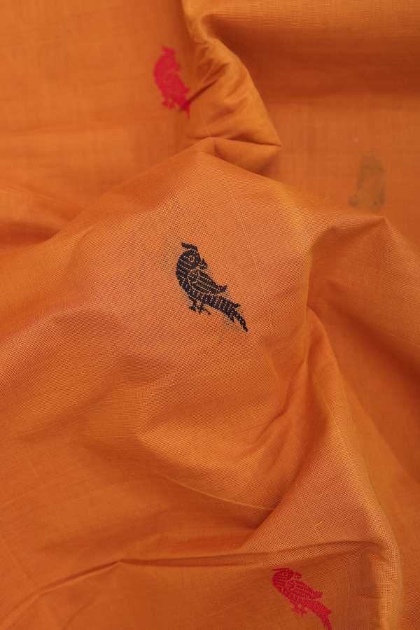 Chettinadu Cotton Saree In Orange With Parrot Buttas