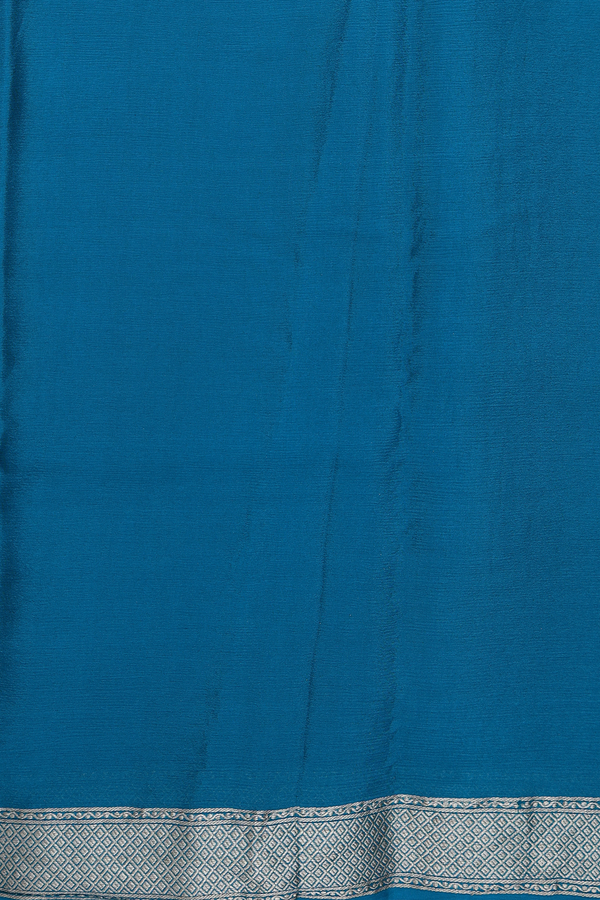 Chiffon Saree In Plain Peacock Blue With Zari Border
