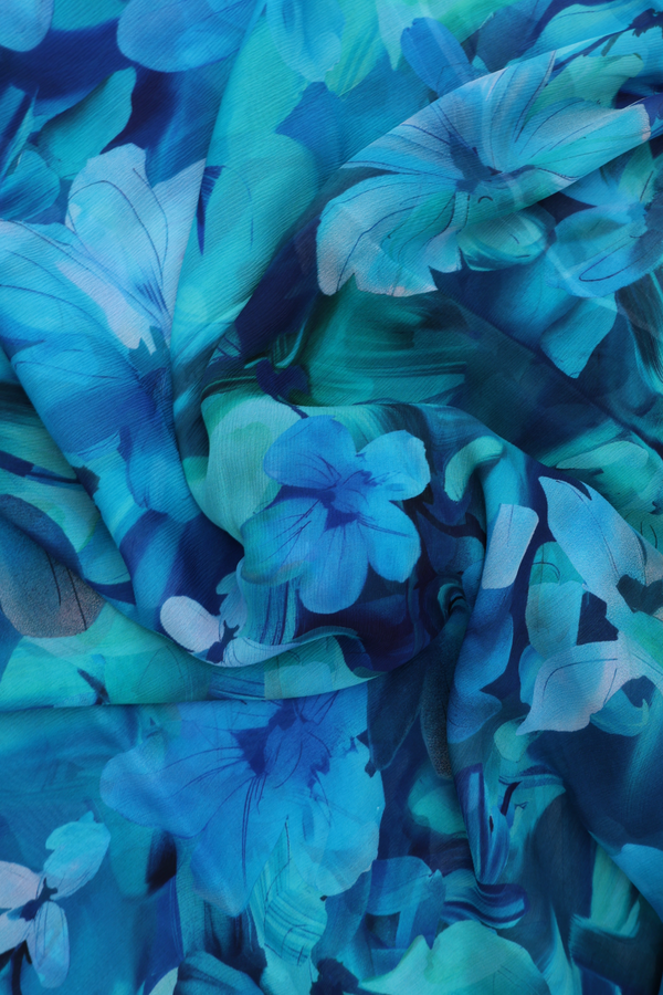 Chiffon Saree In Shades Of Blue With Floral Printed Design