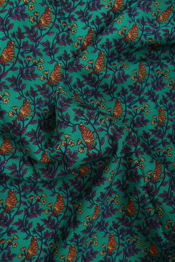 Crepe Saree In Forest Green With Floral And Parrot Design