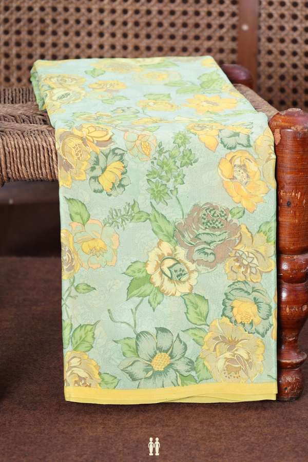 Crepe Saree In Greyish Green With Floral Design