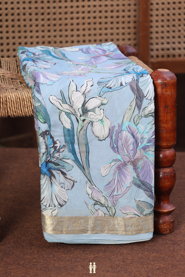 Crepe Saree In Pastel Blue With Floral Design