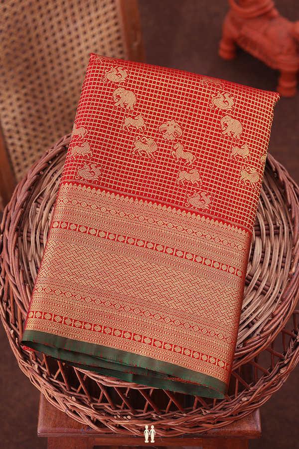 Kanchipuram Silk Saree In Red Along Checks With Buttas