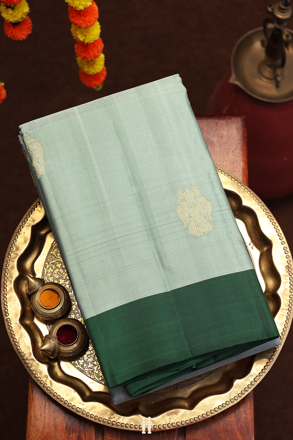 Kanchipuram Silk In Greenish Grey With Iruthalai Pakshi Buttas