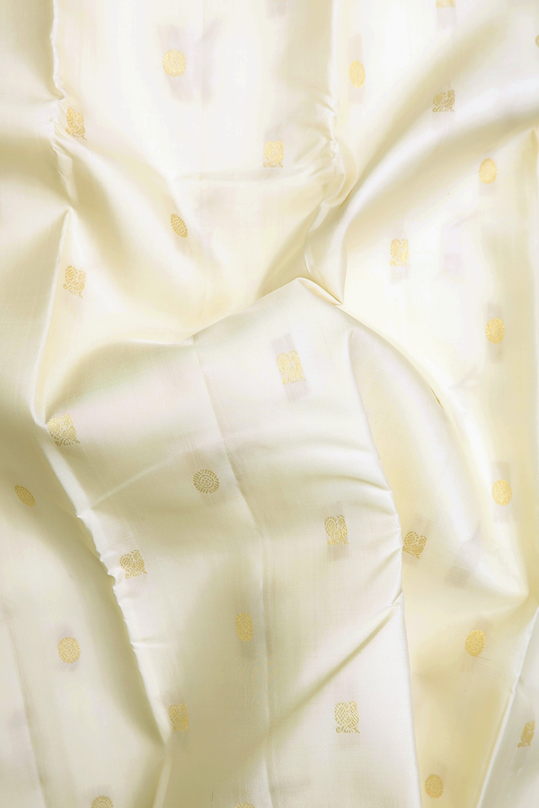Kanchipuram Silk Saree In White With Peacock Buttas