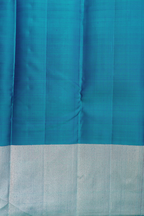 Kanchipuram Silk Saree In Teal Blue With Malli Moggu Buttas