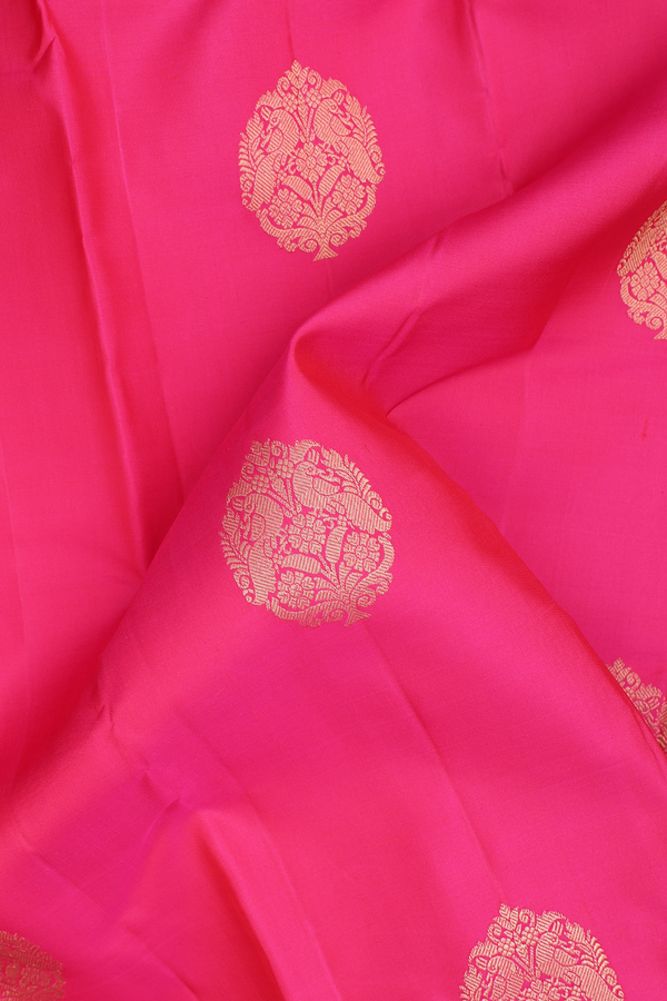 Kanchipuram Silk Saree In Rani Pink With Zari Motifs