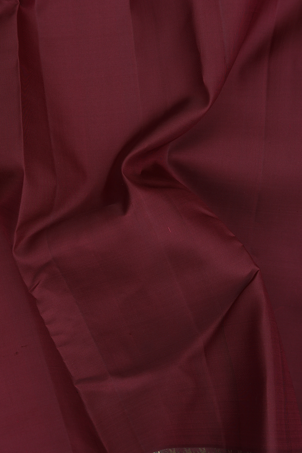 Kanchipuram Silk Saree In Maroon With Zari Border