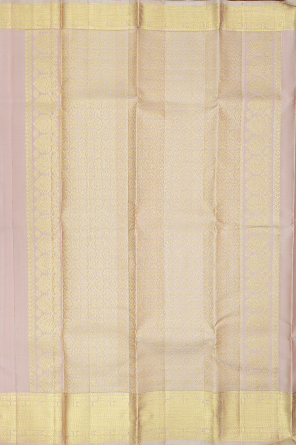 Kanchipuram Silk Saree In Cream Color With Peacock Buttas