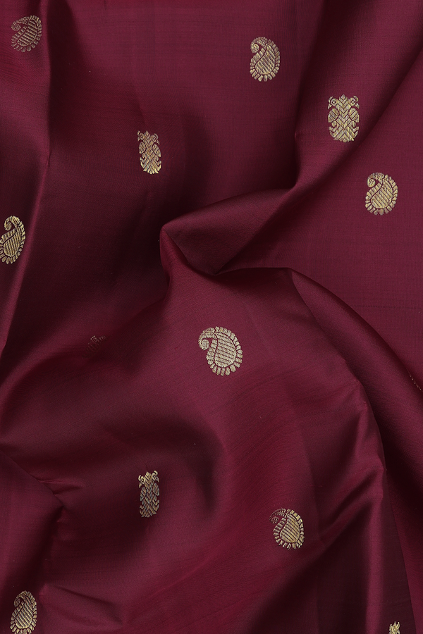 Kanchipuram Silk Saree In Red With Iruthalai Pakshi Buttas