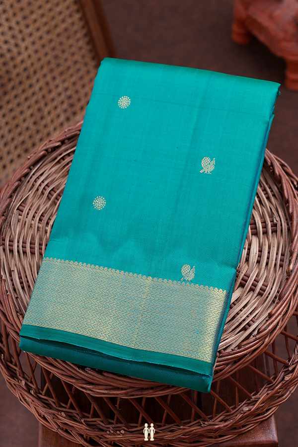 Kanchipuram Silk Saree In Peacock Blue With Chakram Buttas