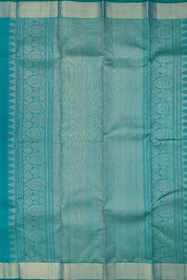 Kanchipuram Silk Saree In Peacock Blue With Chakram Buttas