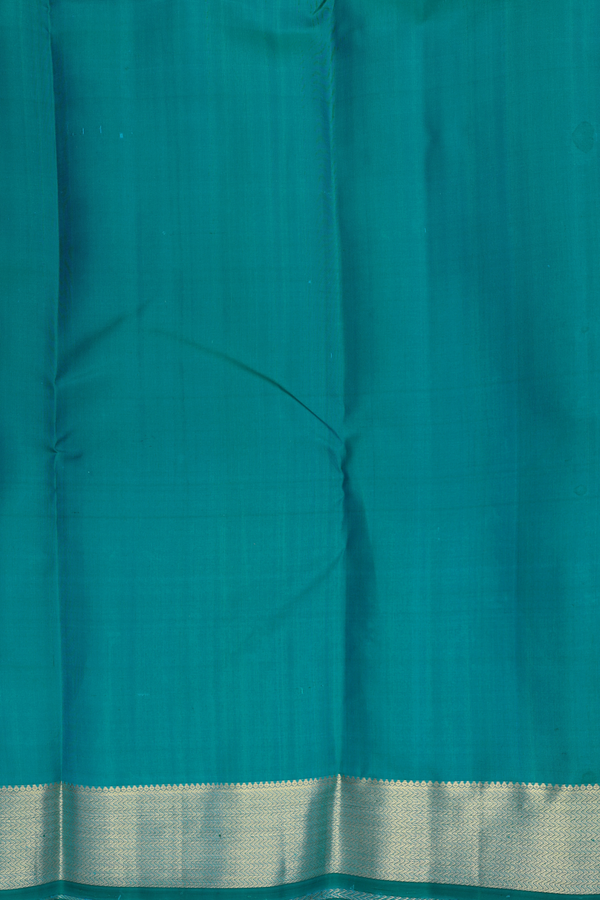 Kanchipuram Silk Saree In Peacock Blue With Chakram Buttas