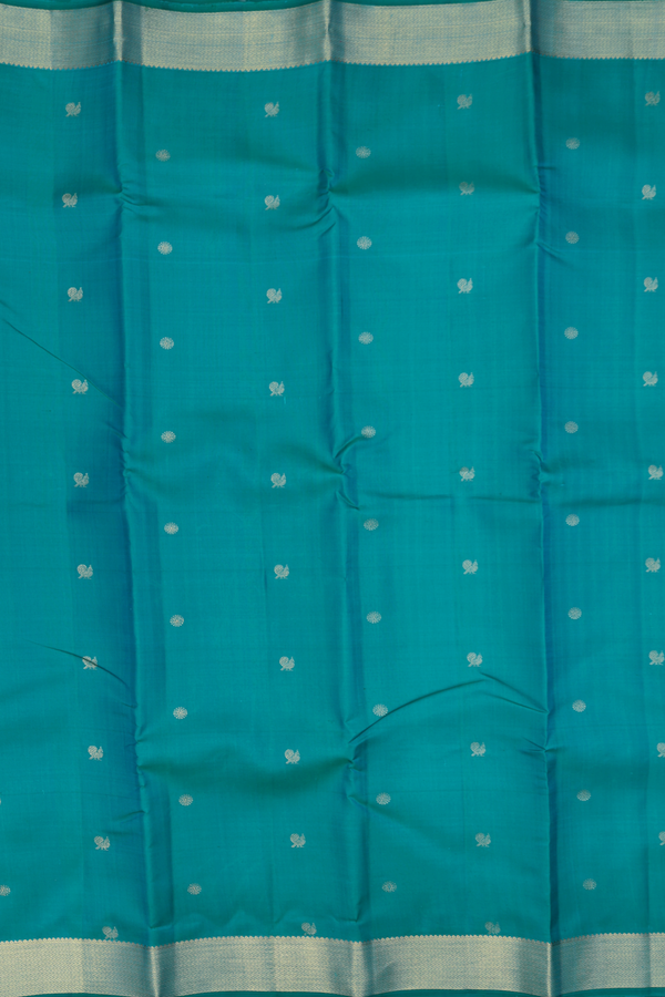 Kanchipuram Silk Saree In Peacock Blue With Chakram Buttas