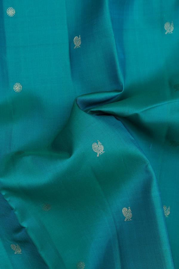 Kanchipuram Silk Saree In Peacock Blue With Chakram Buttas