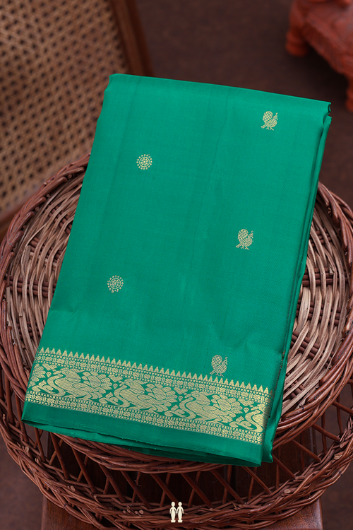 Kanchipuram Silk Saree In Green With Peacock Buttas