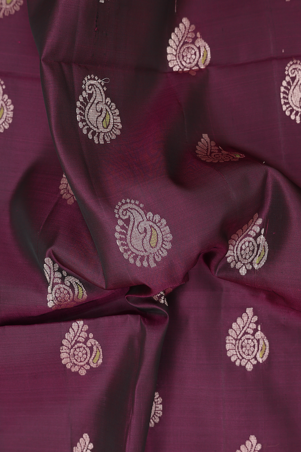 Soft Silk Saree In Plum Purple With Paisley Buttas