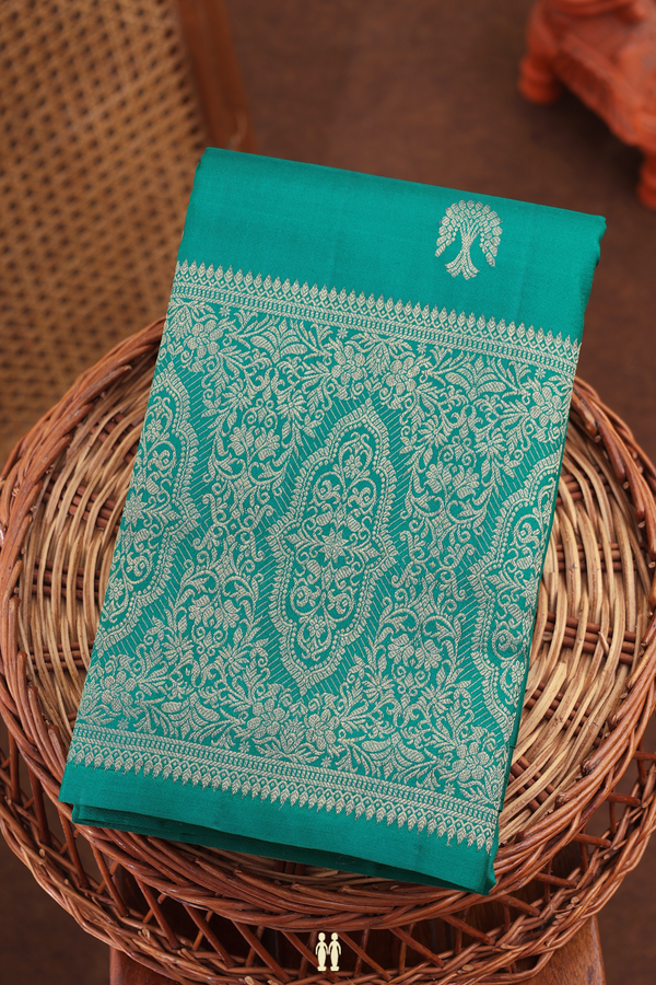 Kanchipuram Silk Saree In Peacock Green With Zari Buttas