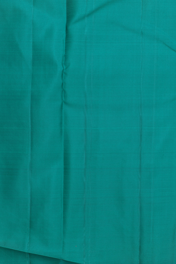 Kanchipuram Silk Saree In Peacock Green With Zari Buttas