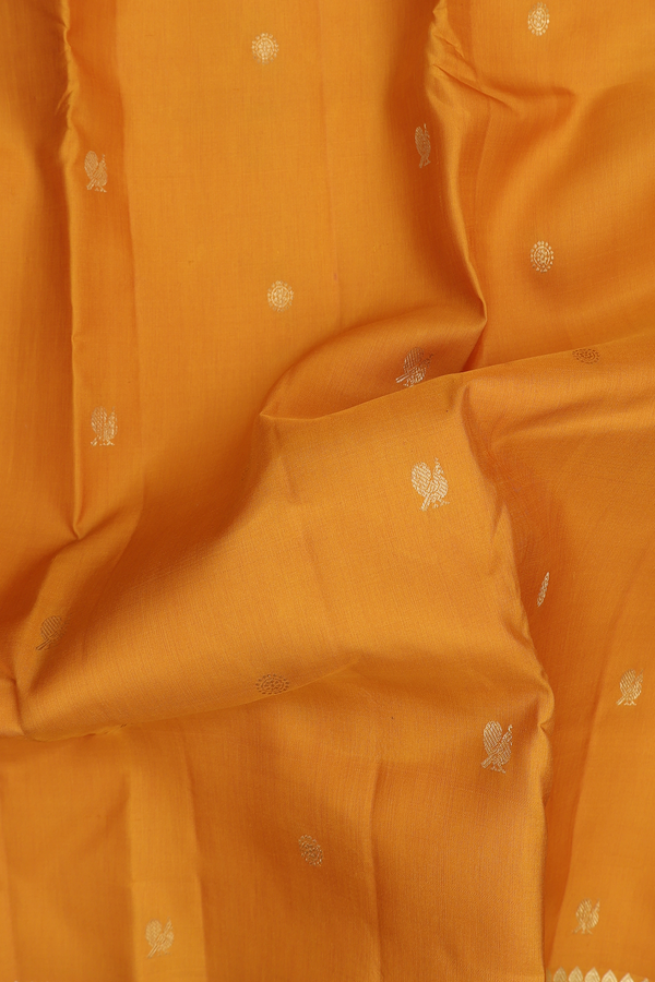 Kanchipuram Silk Saree In Marigold With Peacock Buttas