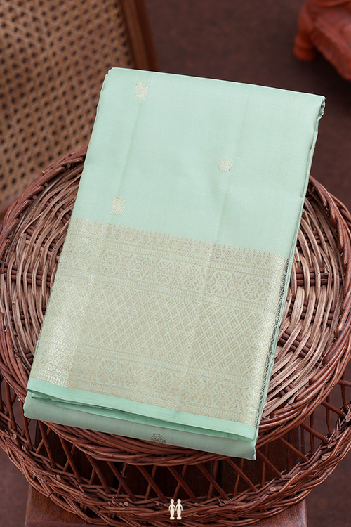 Kanchipuram Silk Saree In Pastel Green With Peacock Buttas